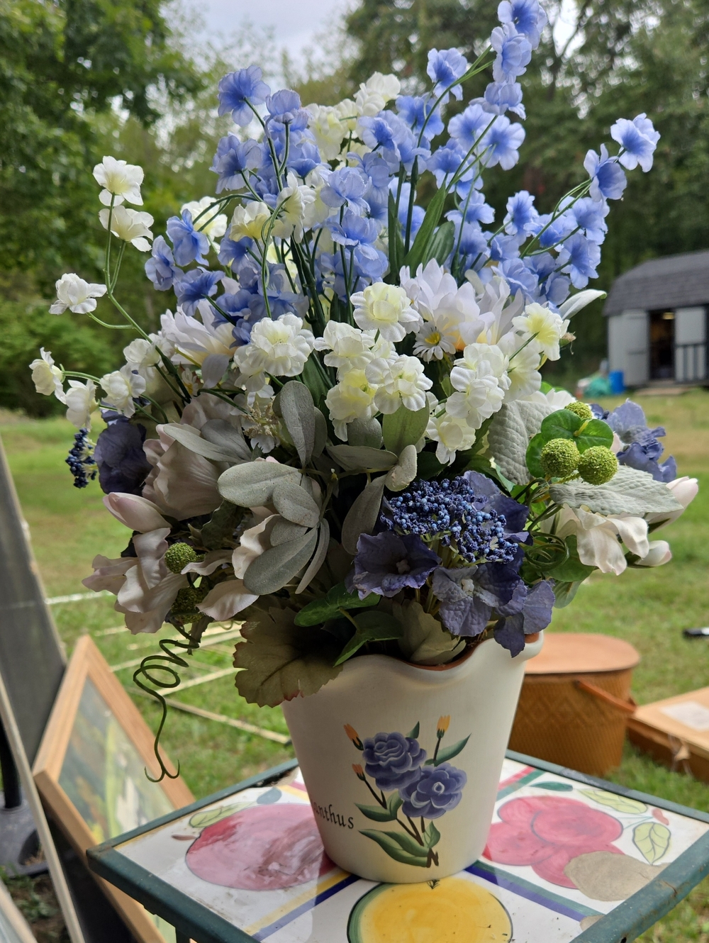 Artificial Floral Arrangement in Blue and Cream Ceramic Vase